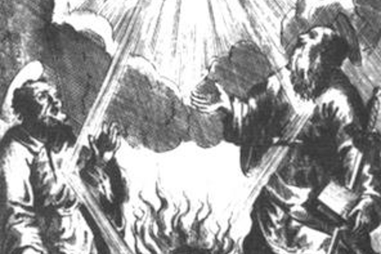 Holzschnitt einer Bücherverbrennung der Inquisition: Der Heilige Geist entfacht das Feuer.
