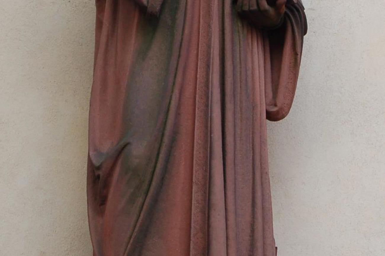 Skulptur von Oekolampad am Basler Münster: Der Reformator stand im Schatten von Erasmus von Rotterdam.